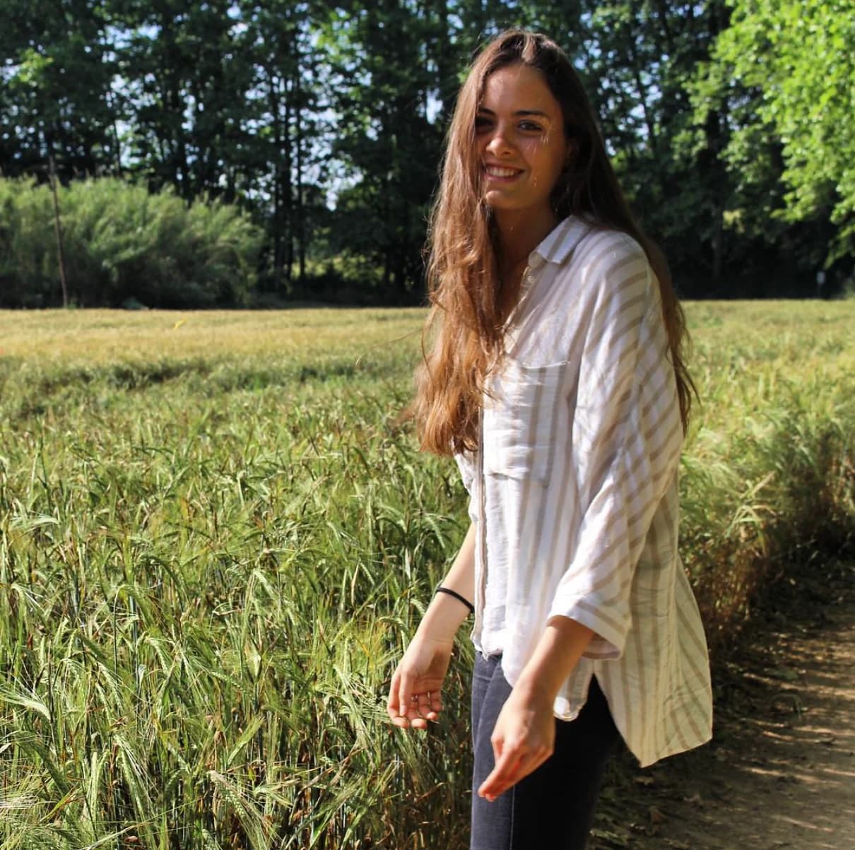 Nuria smiling outdoors